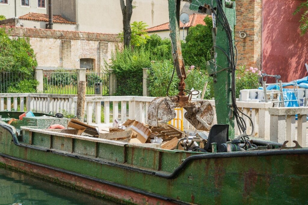 A garbage barge equipped with a garbage compactor