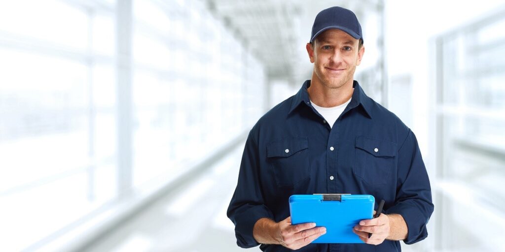 Car mechanic worker with clipboard over blue background