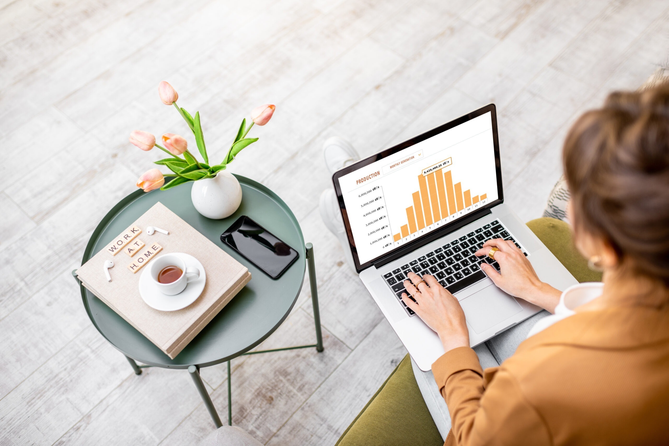 Woman working on computer at home