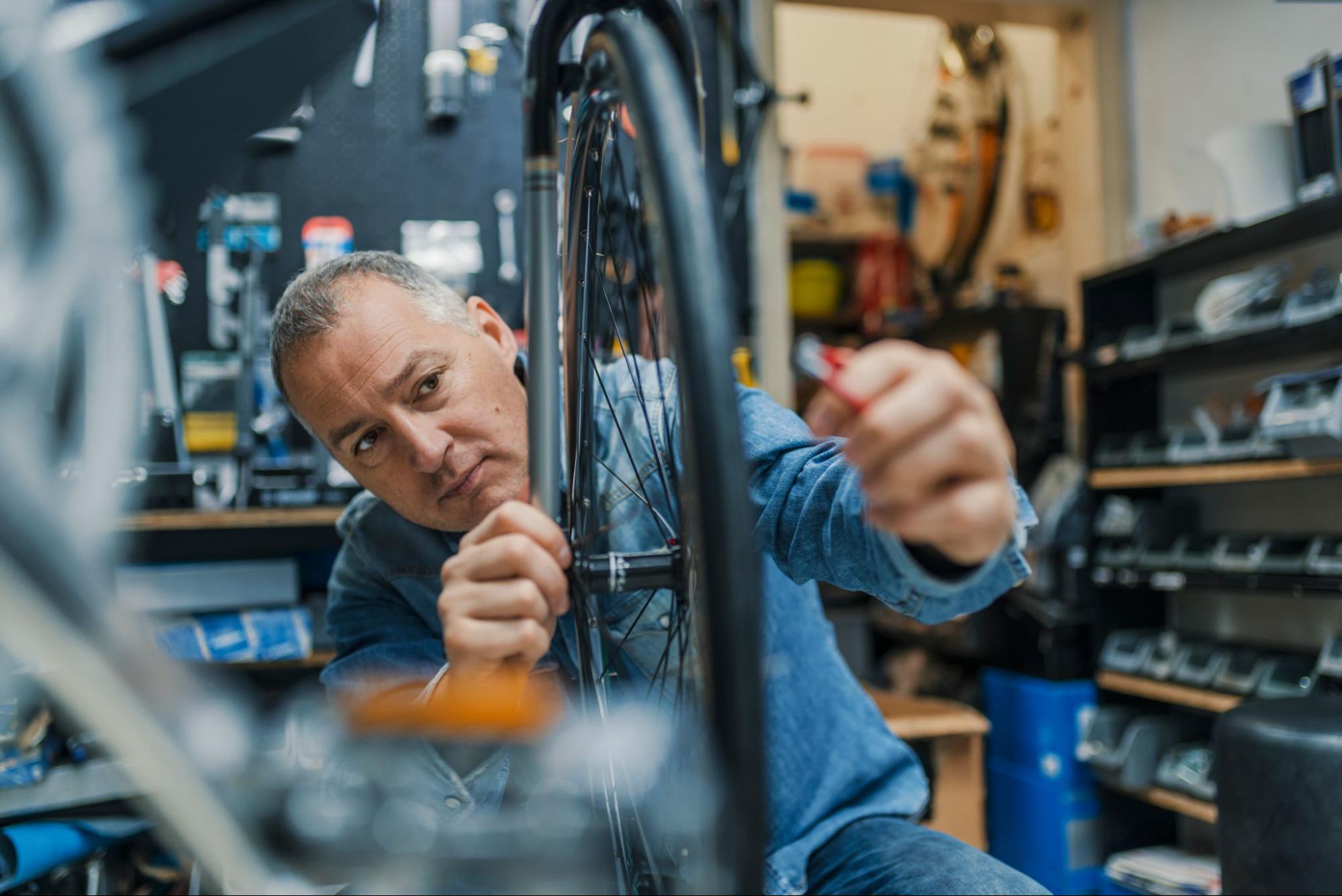 A bike repair shop small business owner