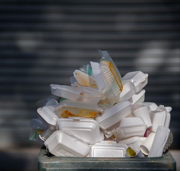 pile of waste foam and plastic in bin
