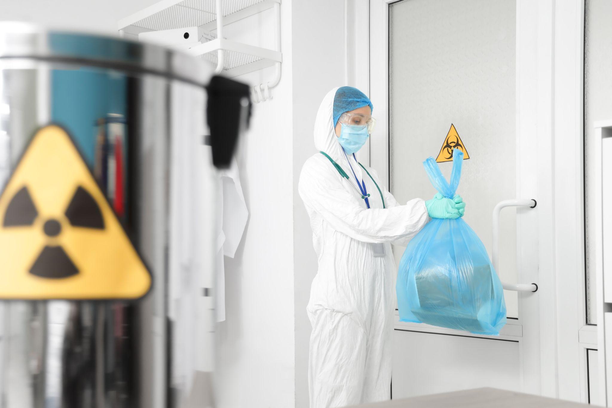 A woman disposing of hazardous waste