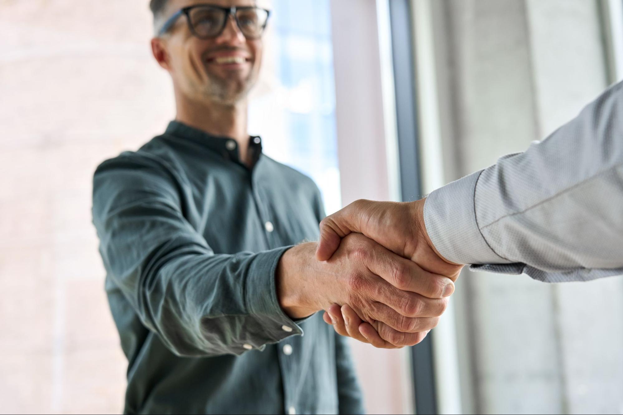 Business people shaking hands